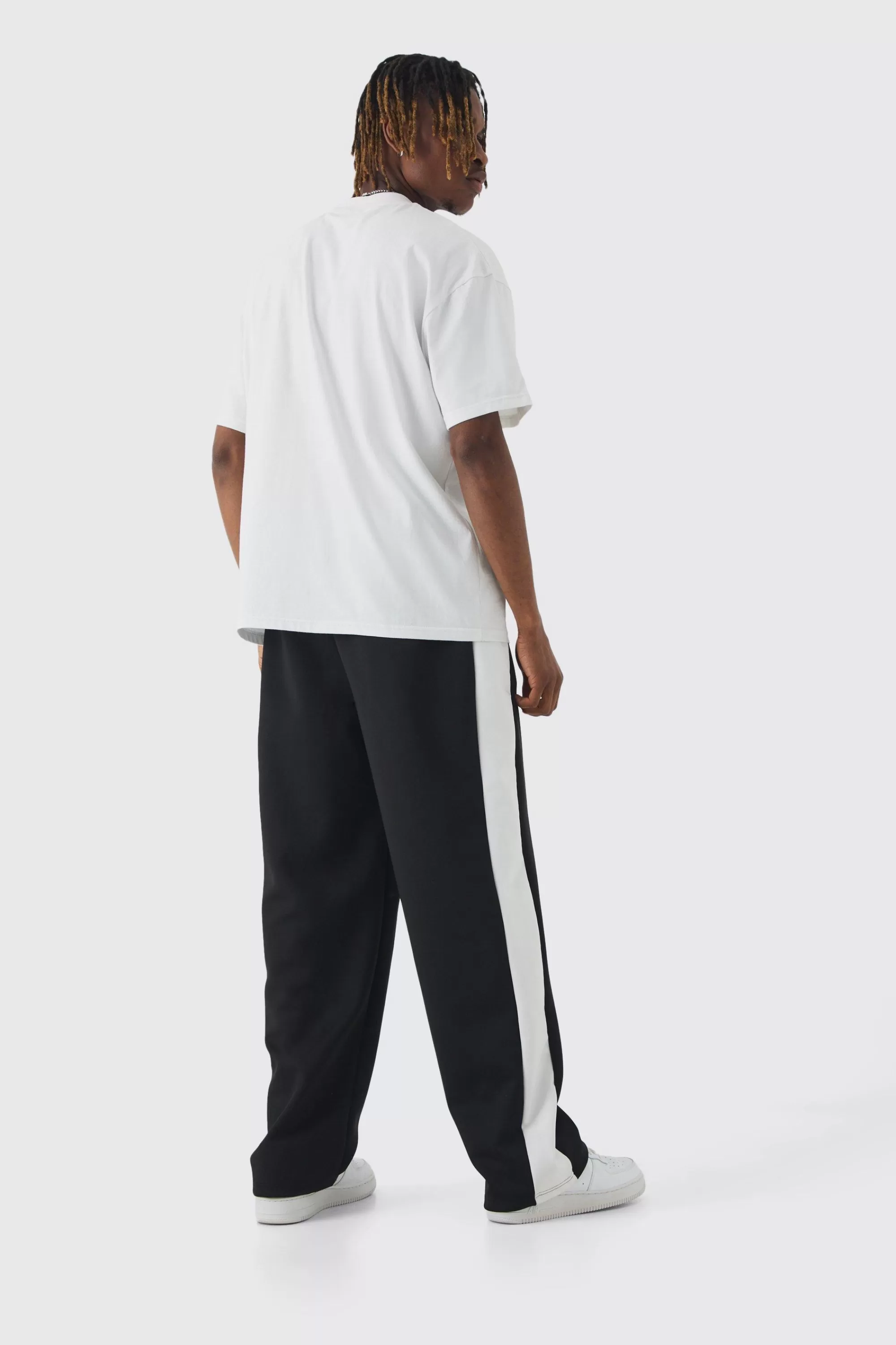 boohooMAN Tall Tricot Side Panel Embroidered Relaxed Fit Trousers | UK