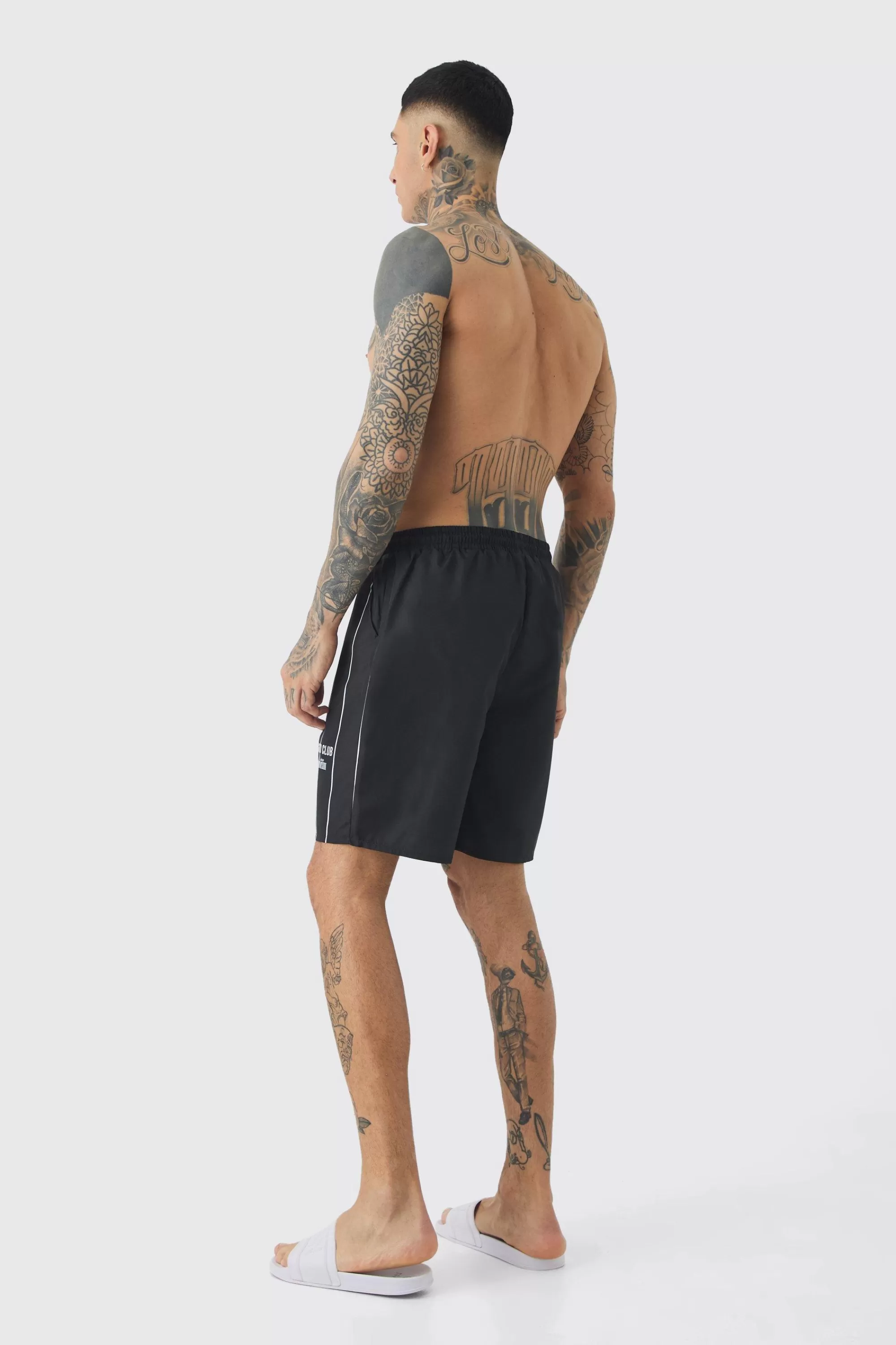 boohooMAN Tall Worldwide Crotch Printed Stripe Swim Shorts | UK