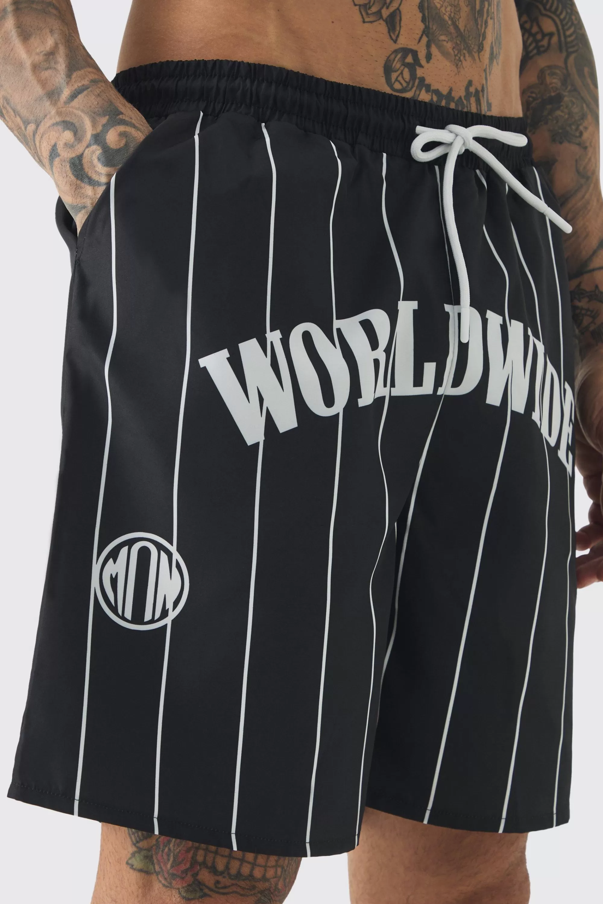 boohooMAN Tall Worldwide Crotch Printed Stripe Swim Shorts | UK
