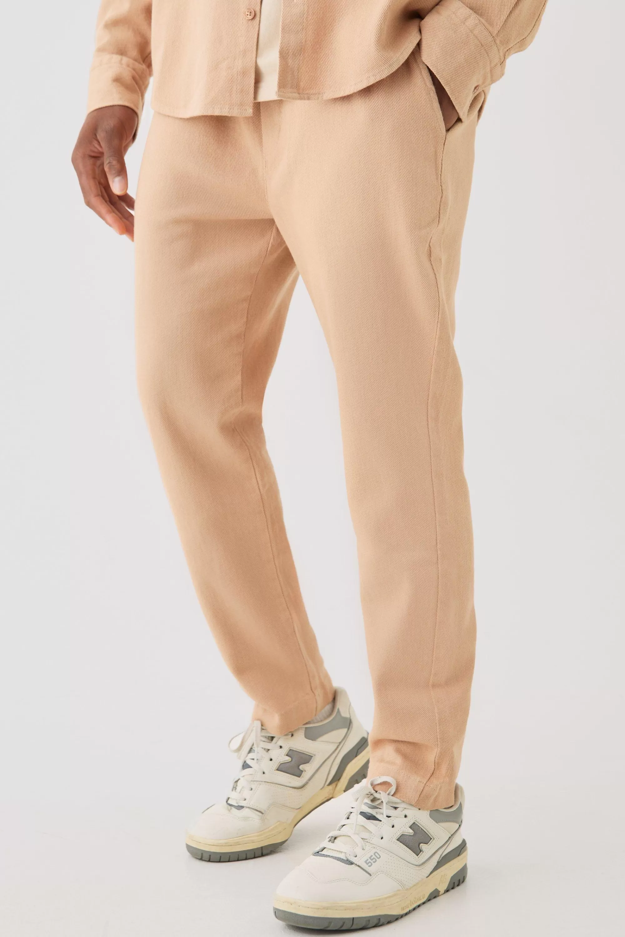 boohooMAN Textured Elasticated Waist Straight Fit Trousers | UK