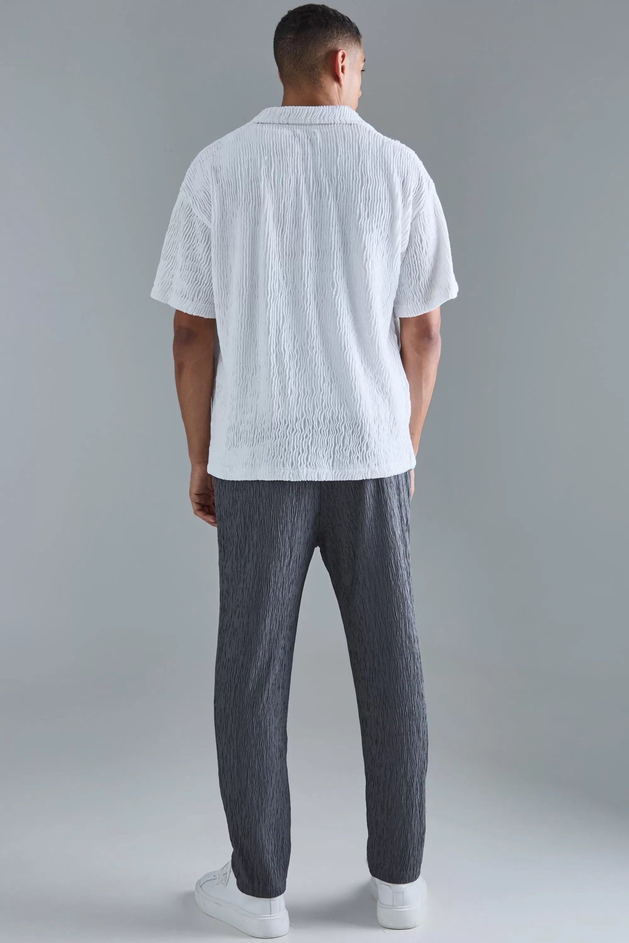 boohooMAN Textured Satin Elasticated Waist Tapered Trousers | UK