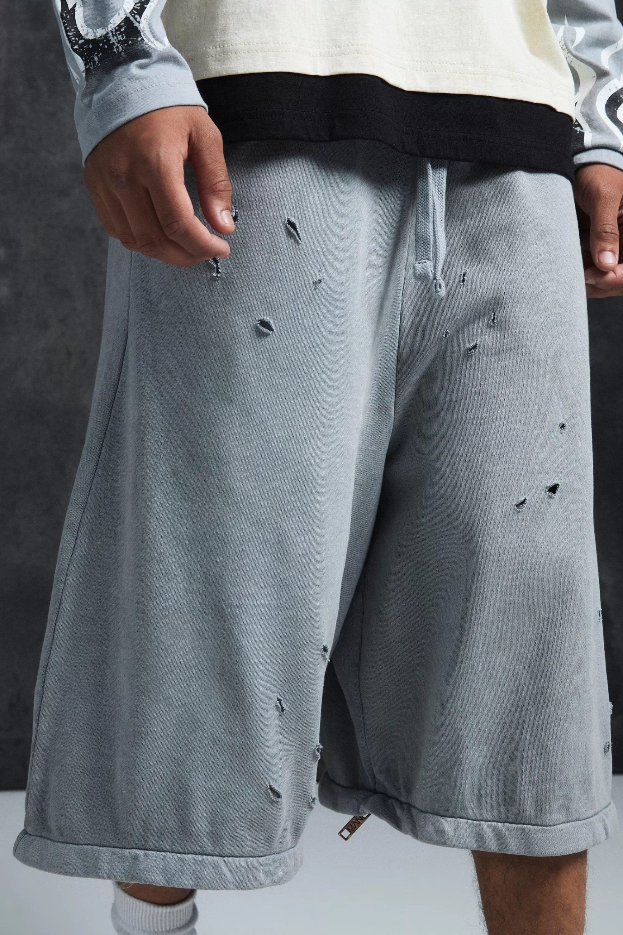 boohooMAN Trippie Redd Baggy Heavyweight Washed & Distressed Jort | UK
