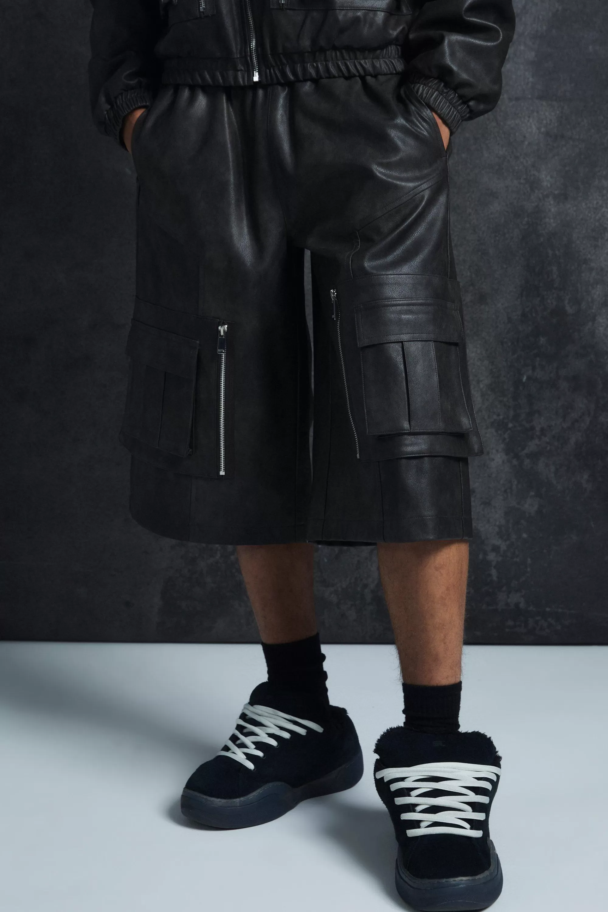 boohooMAN Trippie Redd Relaxed Longline Washed Pu Cargo Jorts In | UK