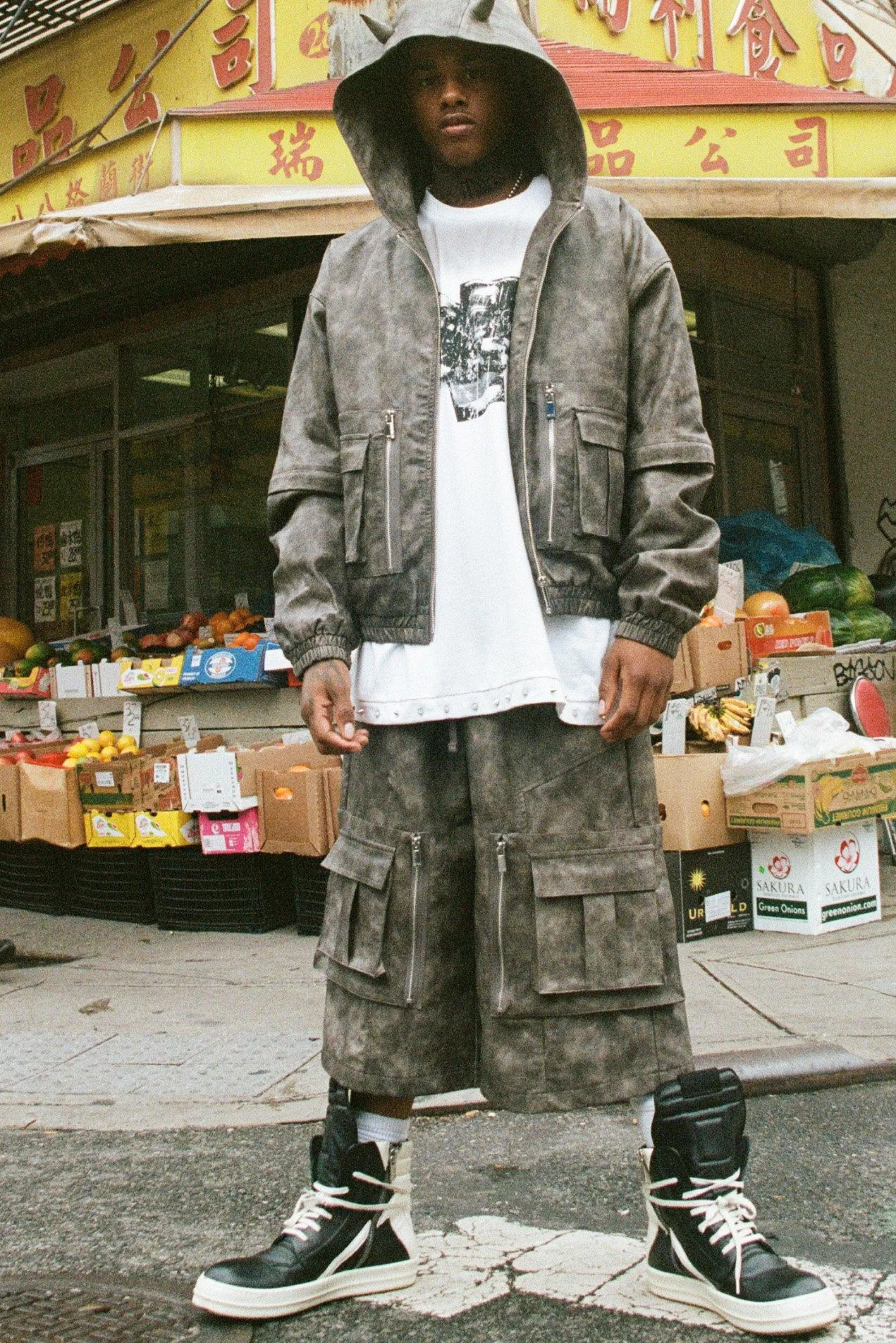 boohooMAN Trippie Redd Relaxed Longline Washed PU Cargo Jorts In | UK