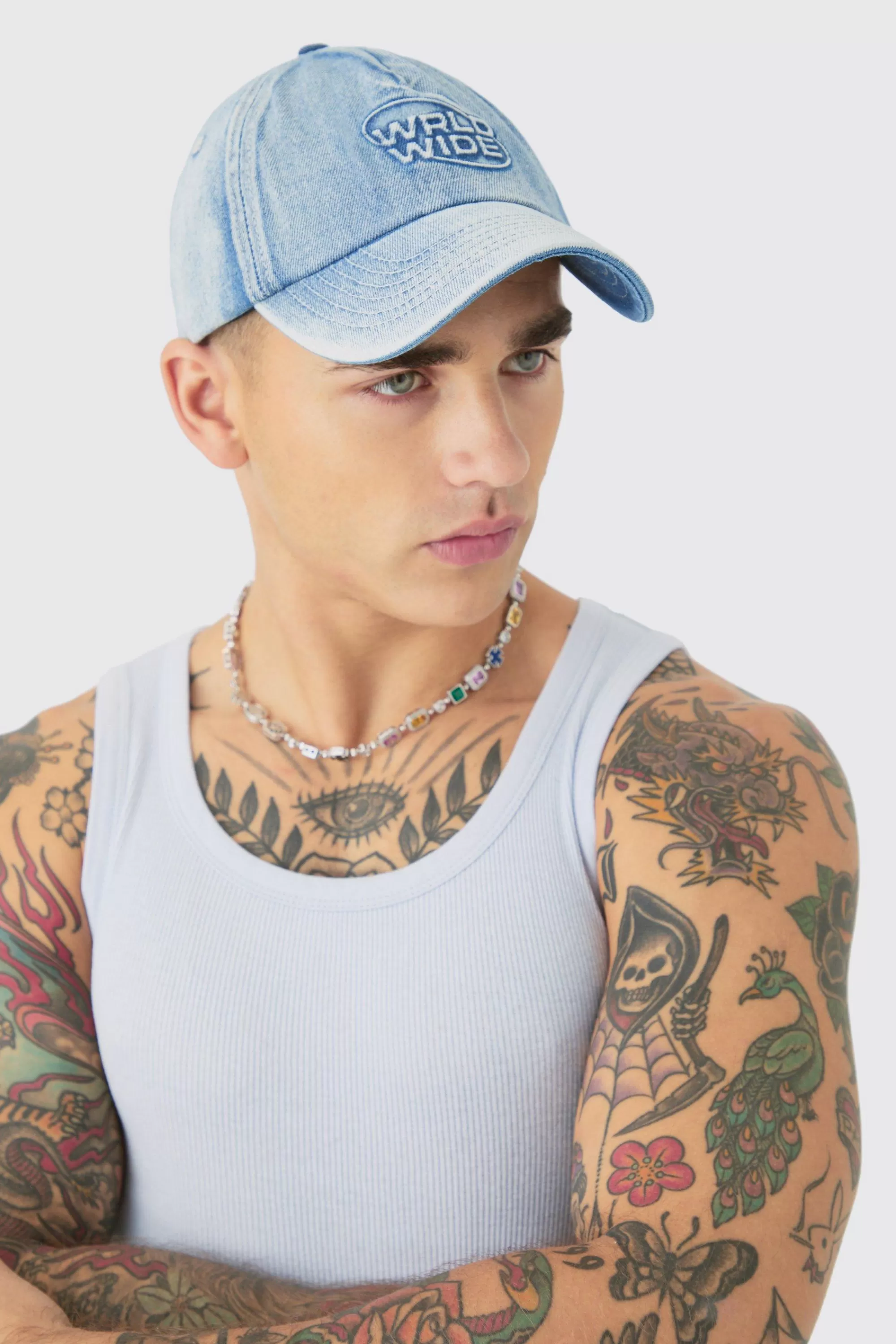 boohooMAN Worldwide Embossed Washed Cap In | UK
