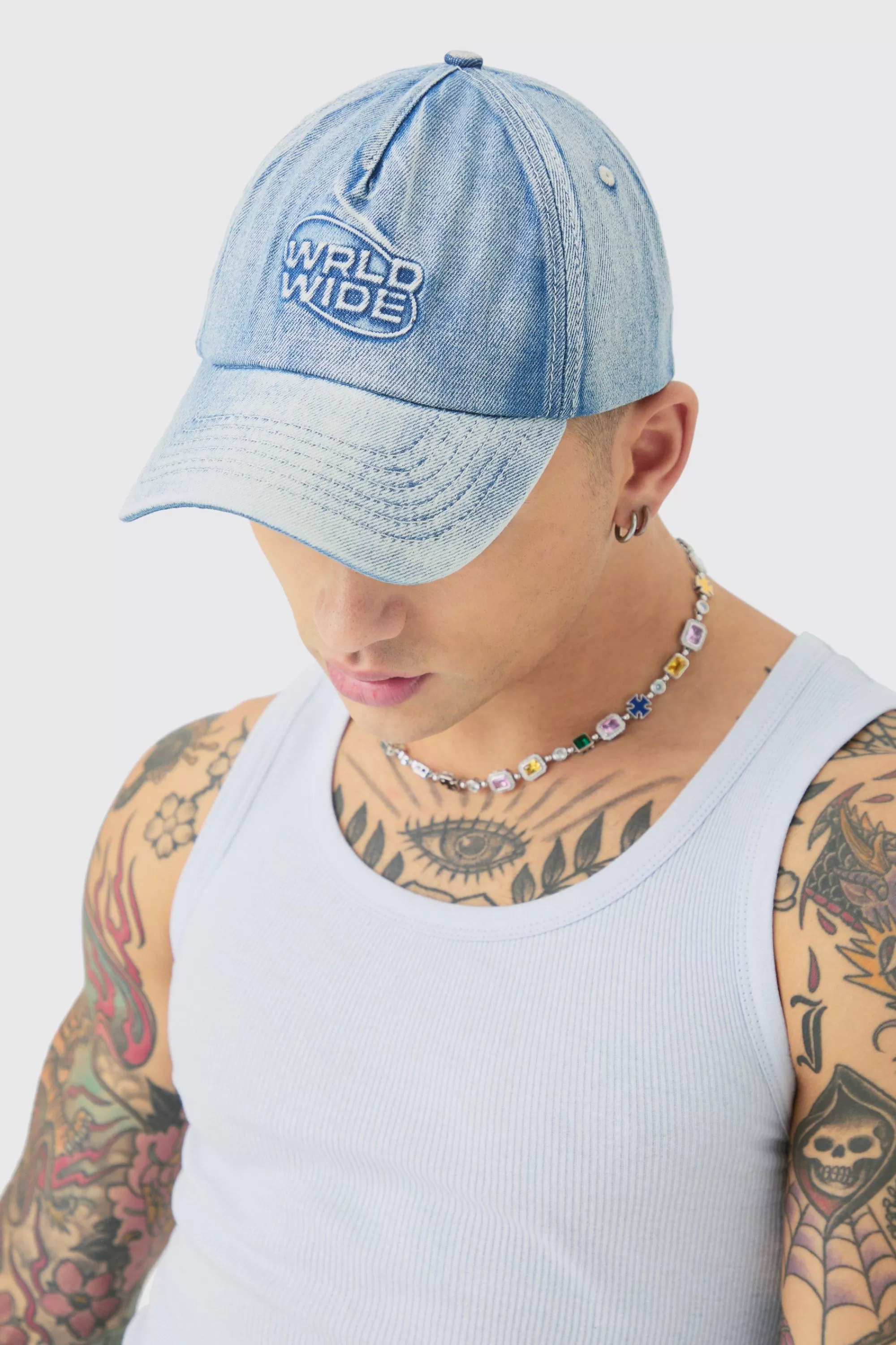 boohooMAN Worldwide Embossed Washed Cap In | UK
