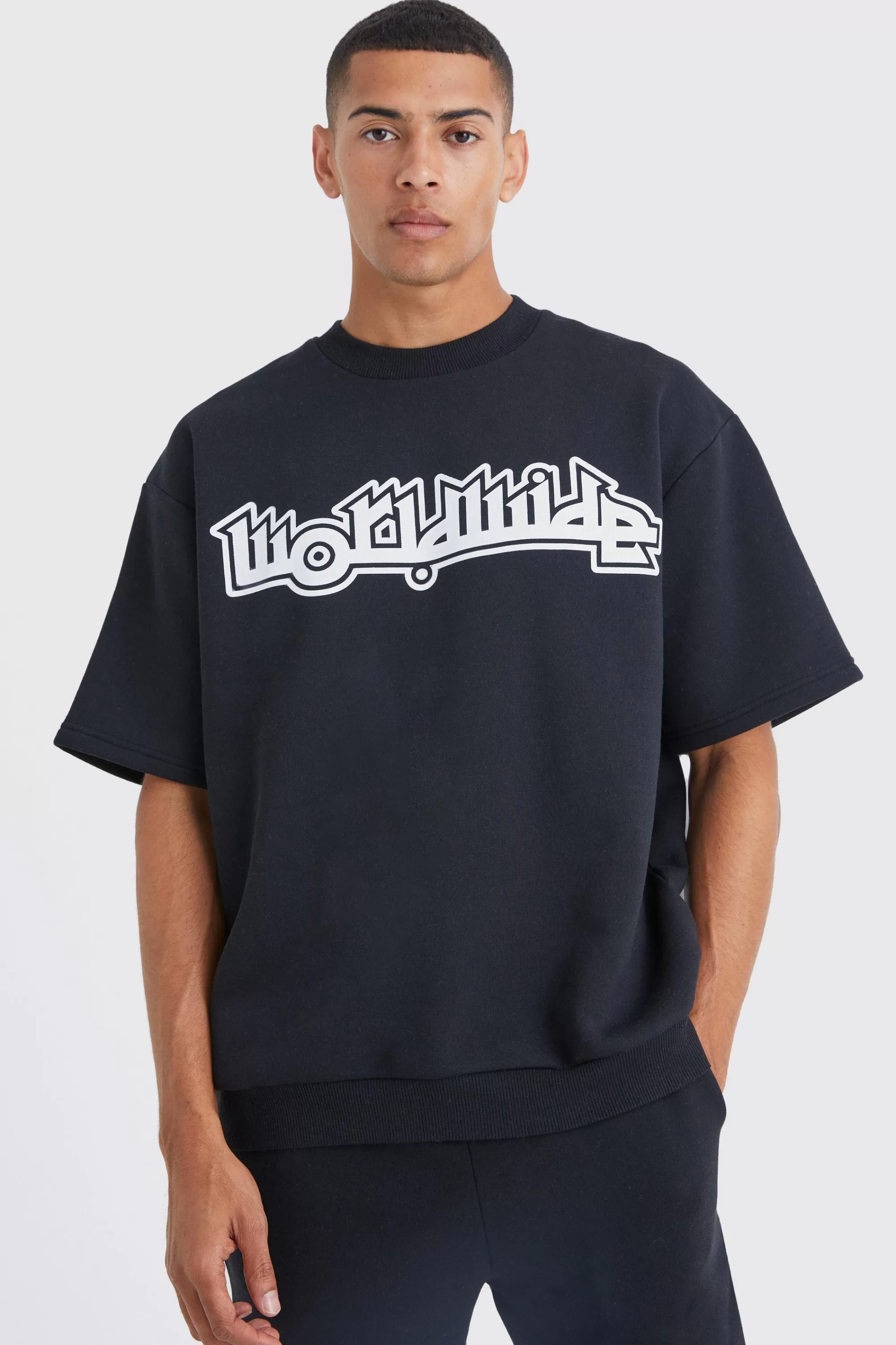 boohooMAN Worldwide Graphic Half Sleeve Sweat Gusset Tracksuit | UK