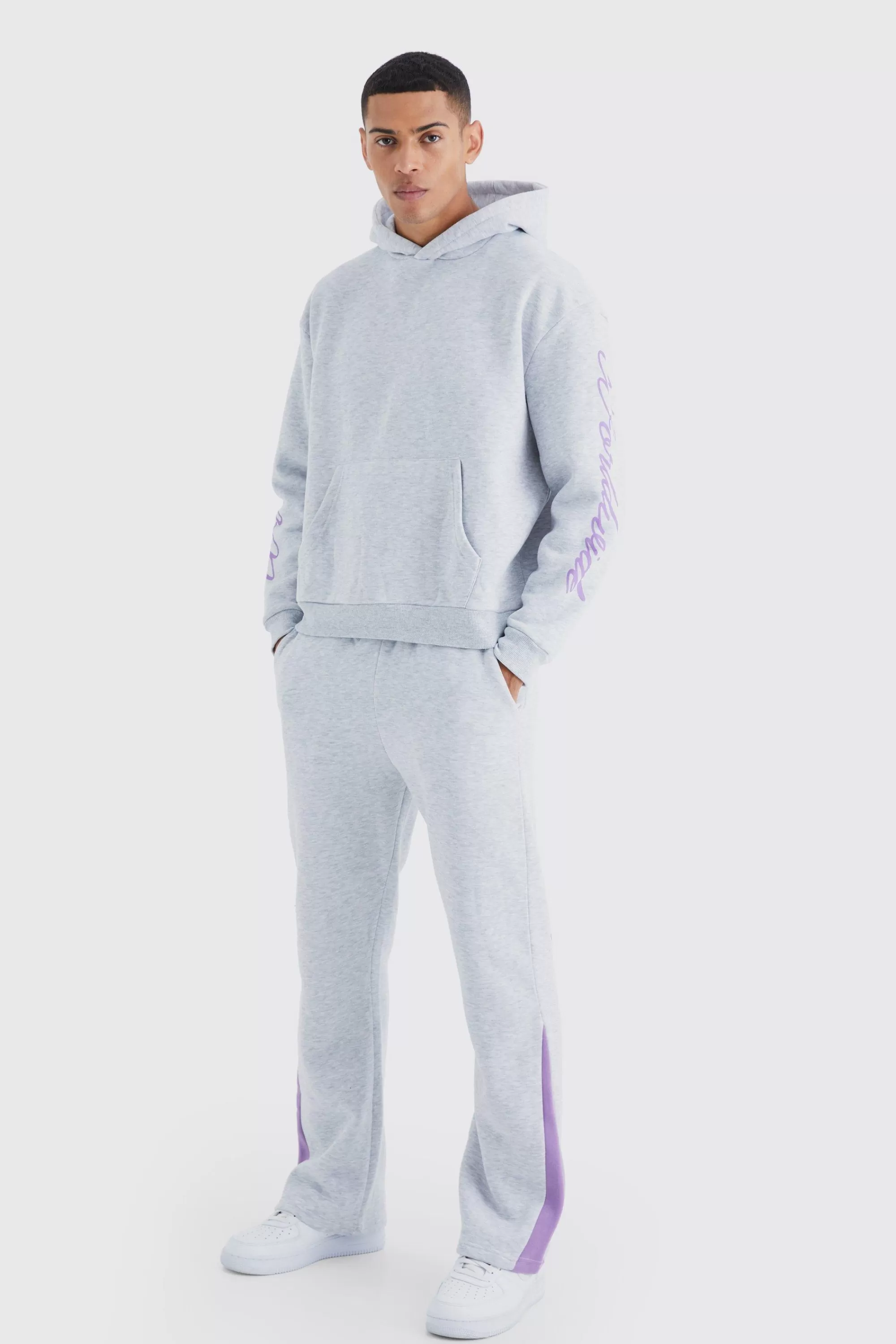 boohooMAN Worldwide Placement Printed Gusset Tracksuit | UK