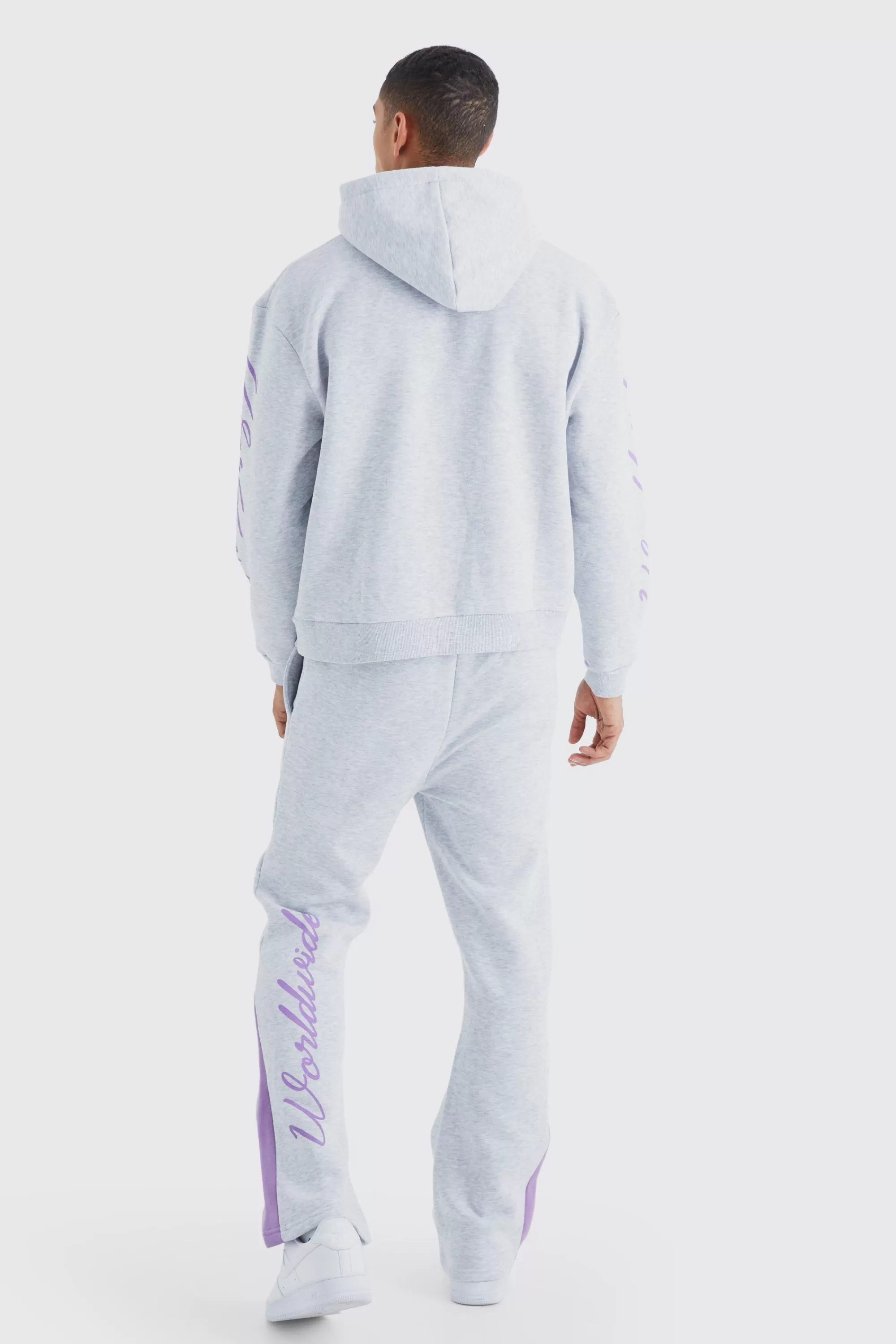 boohooMAN Worldwide Placement Printed Gusset Tracksuit | UK