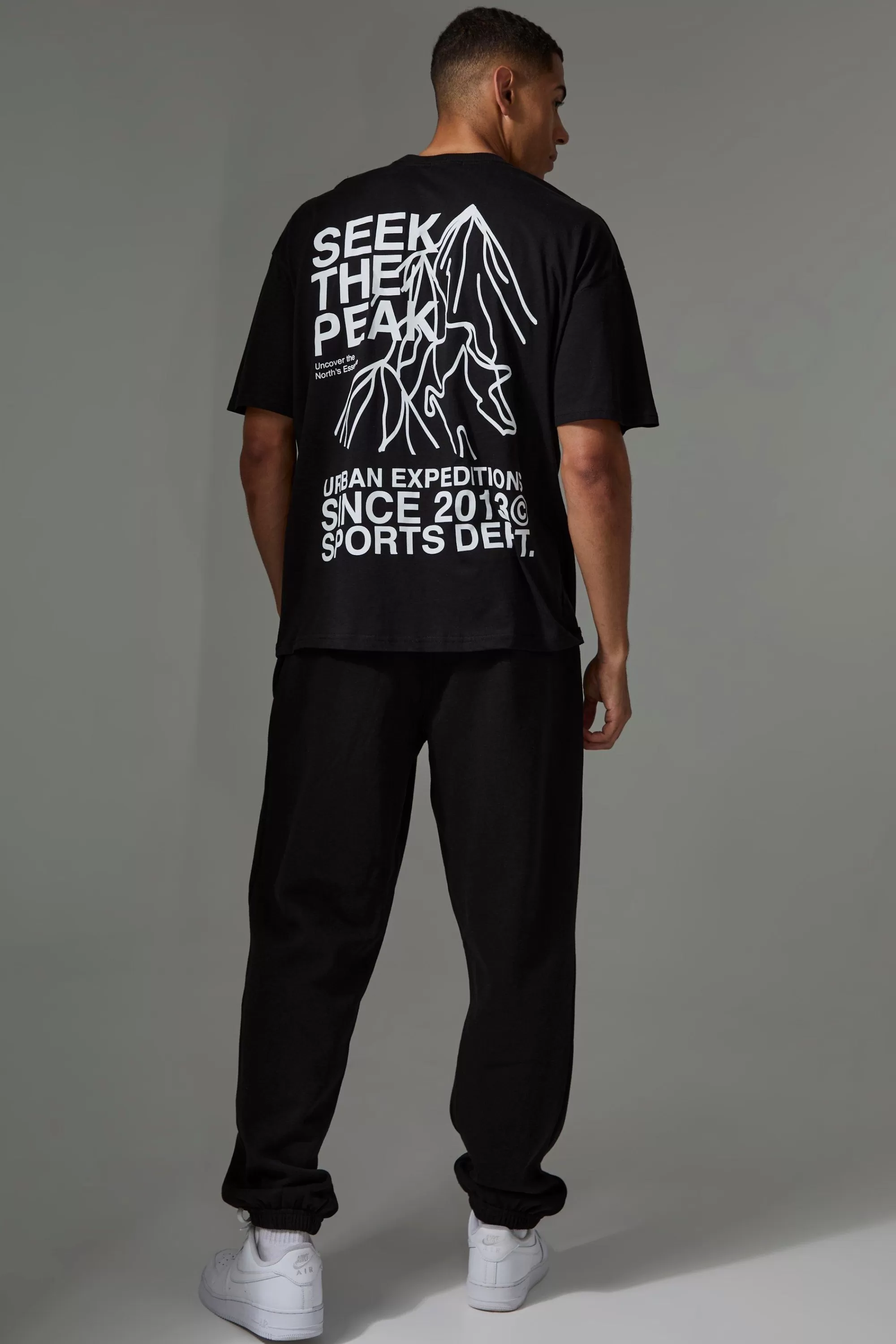 boohooMAN Active Oversized Urban Expeditions T-shirt | UK black Shop