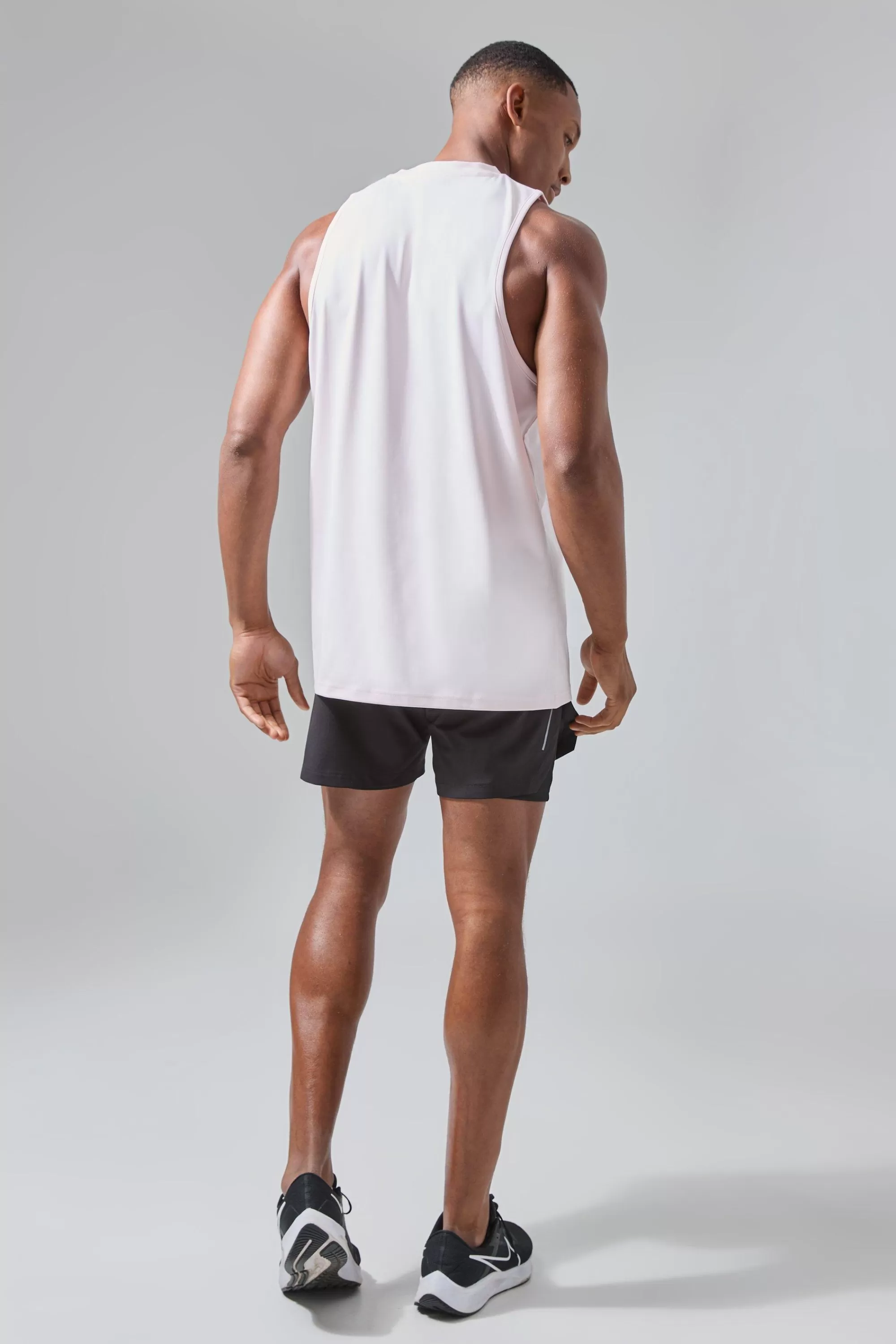 boohooMAN Man Active Performance Reg Fit Tank | UK pink Best