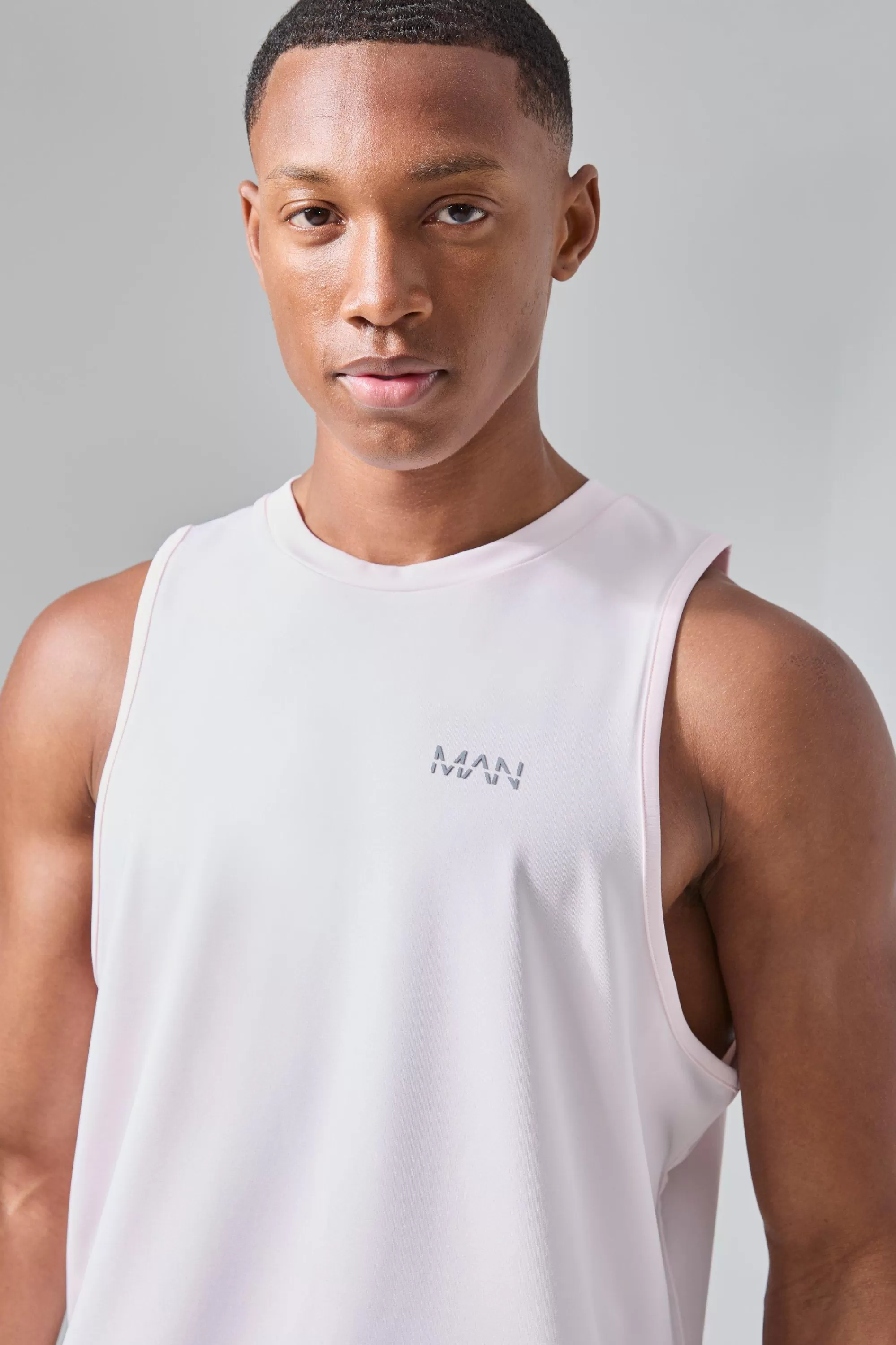 boohooMAN Man Active Performance Reg Fit Tank | UK pink Best