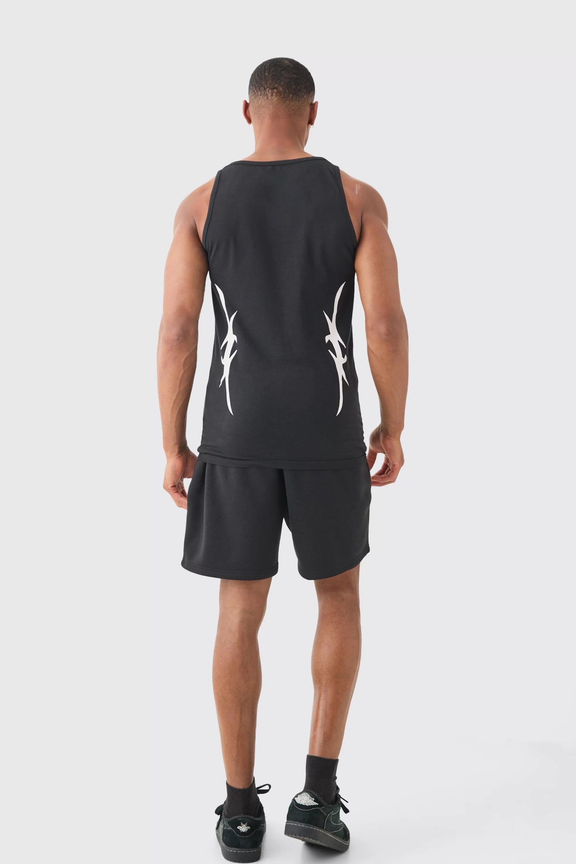boohooMAN Muscle Fit Graphic Official Vest & Shorts Set | UK black Store