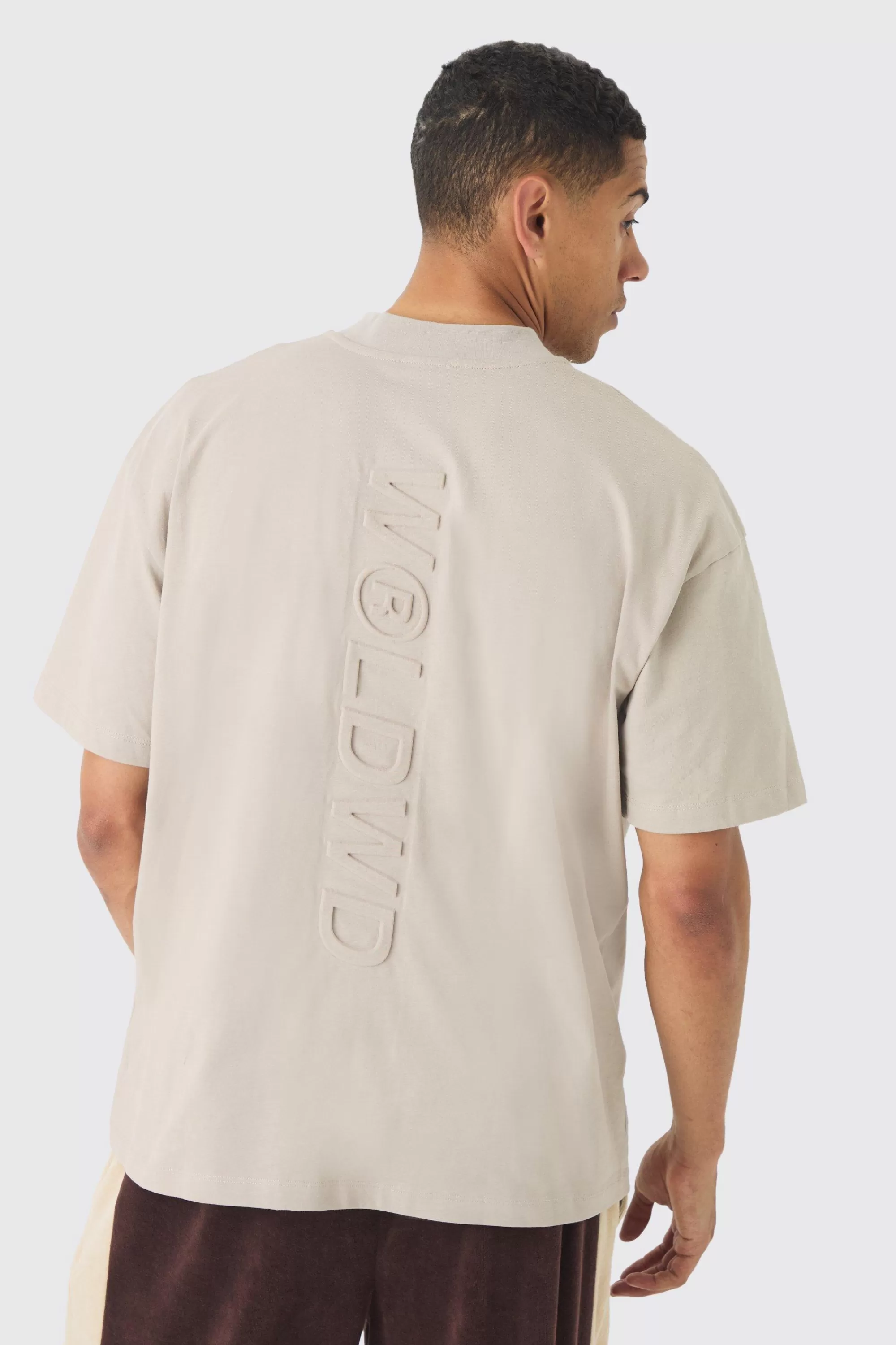 boohooMAN Oversized Extended Neck Embossed Worldwide T-shirt | UK taupe Flash Sale