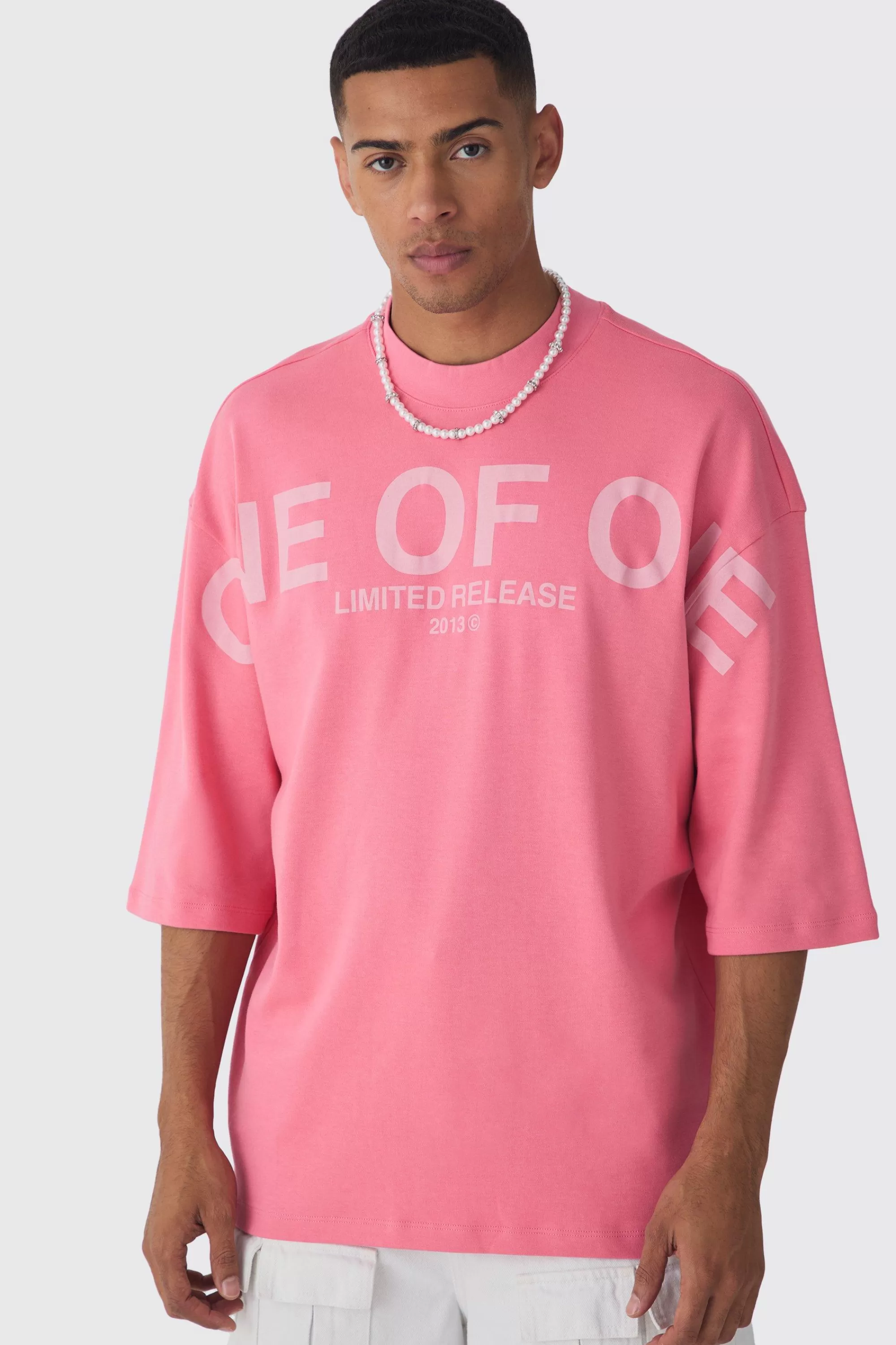 boohooMAN Oversized Extended Neck Interlock Graphic T-shirt | UK pink New
