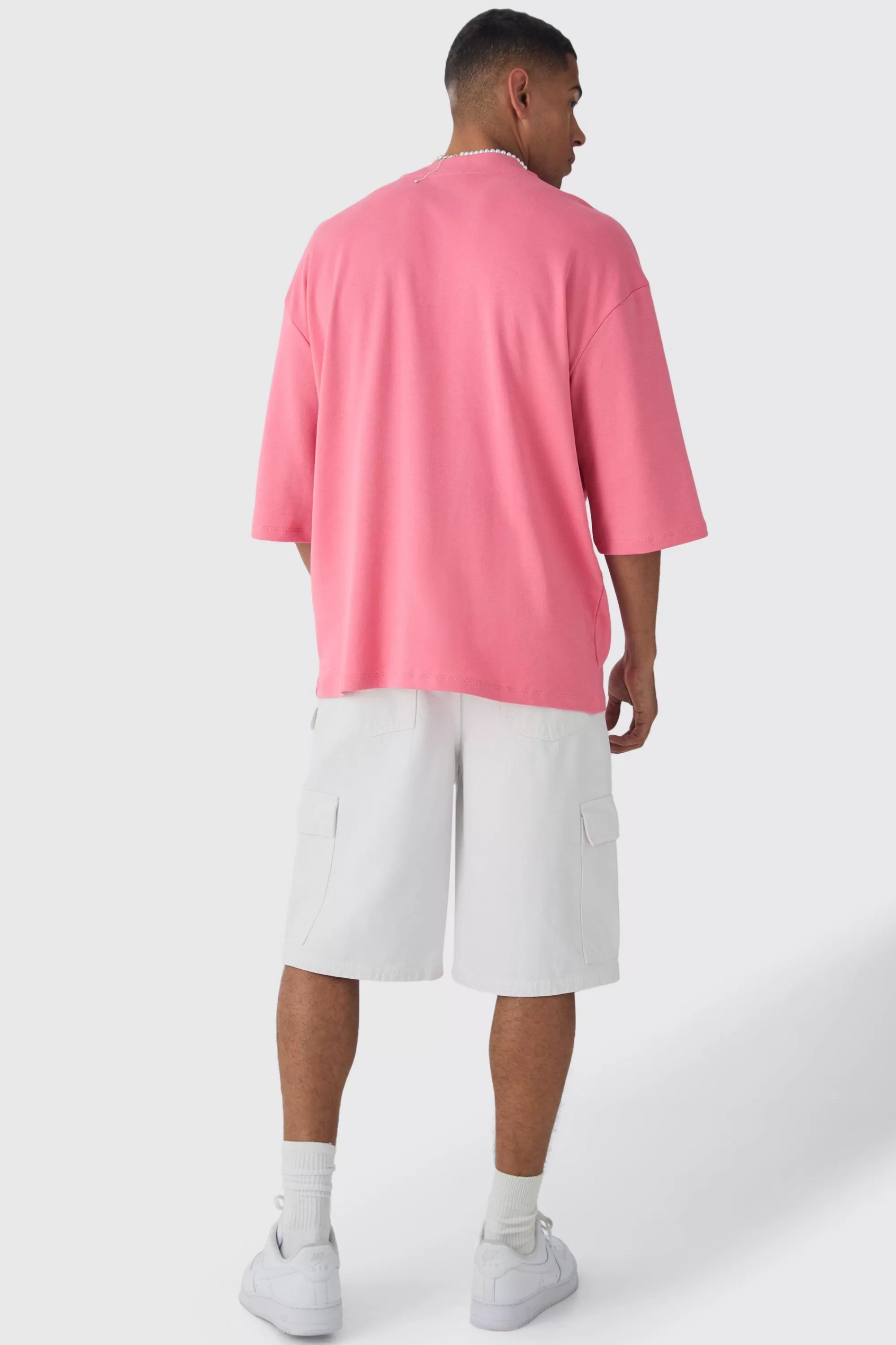 boohooMAN Oversized Extended Neck Interlock Graphic T-shirt | UK pink New