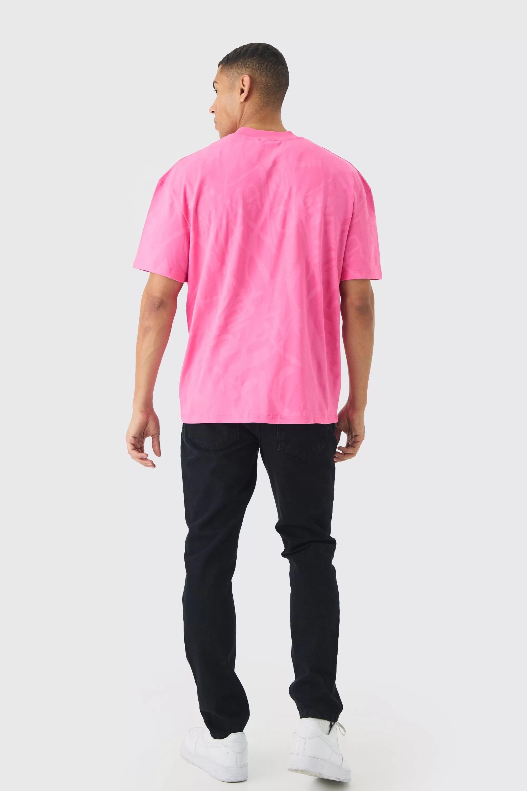 boohooMAN Oversized Extended Neck Official Graffiti Print Wash T-shirt | UK pink Fashion