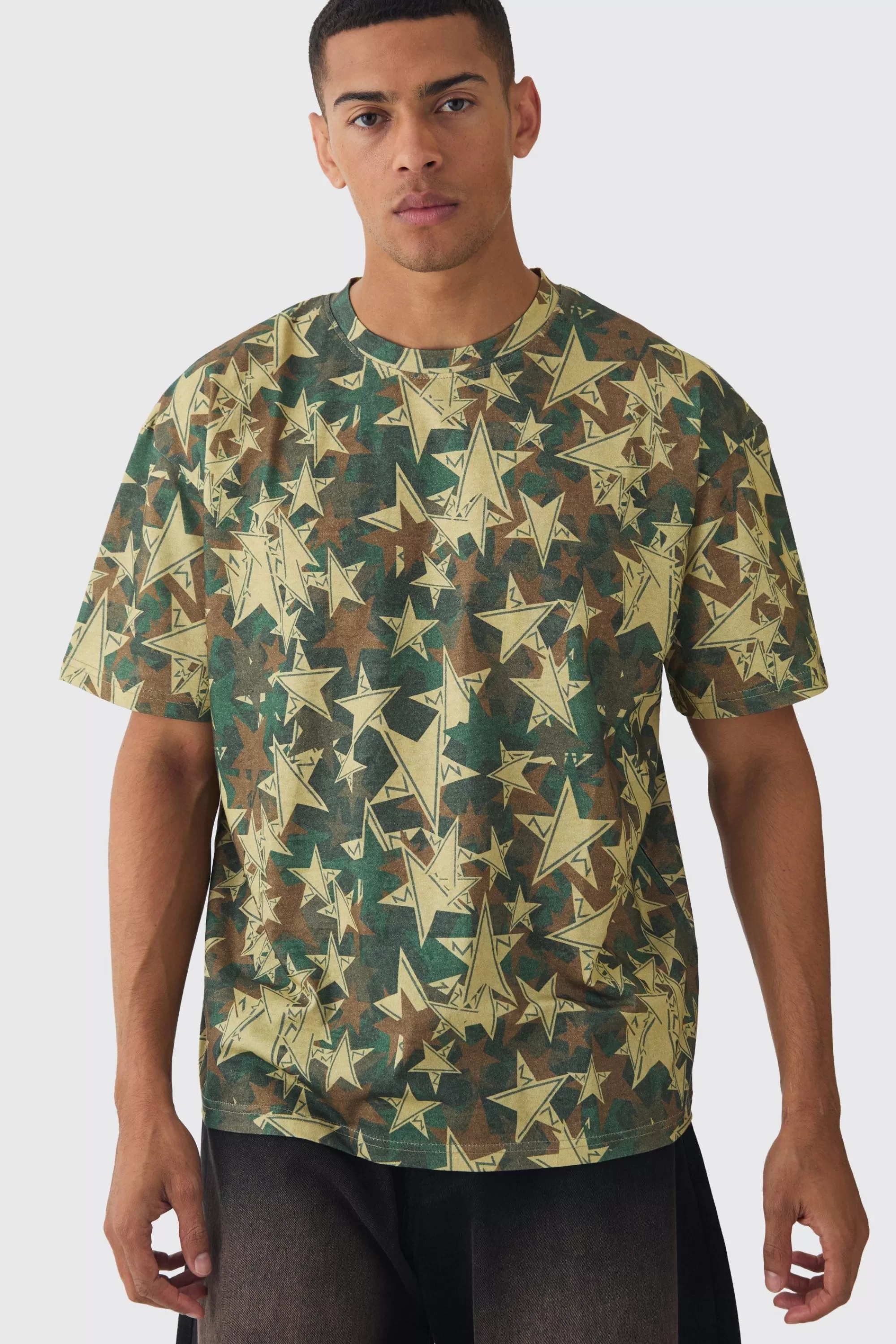 boohooMAN Oversized Extended Neck Star Camo T-shirt | UK khaki Outlet