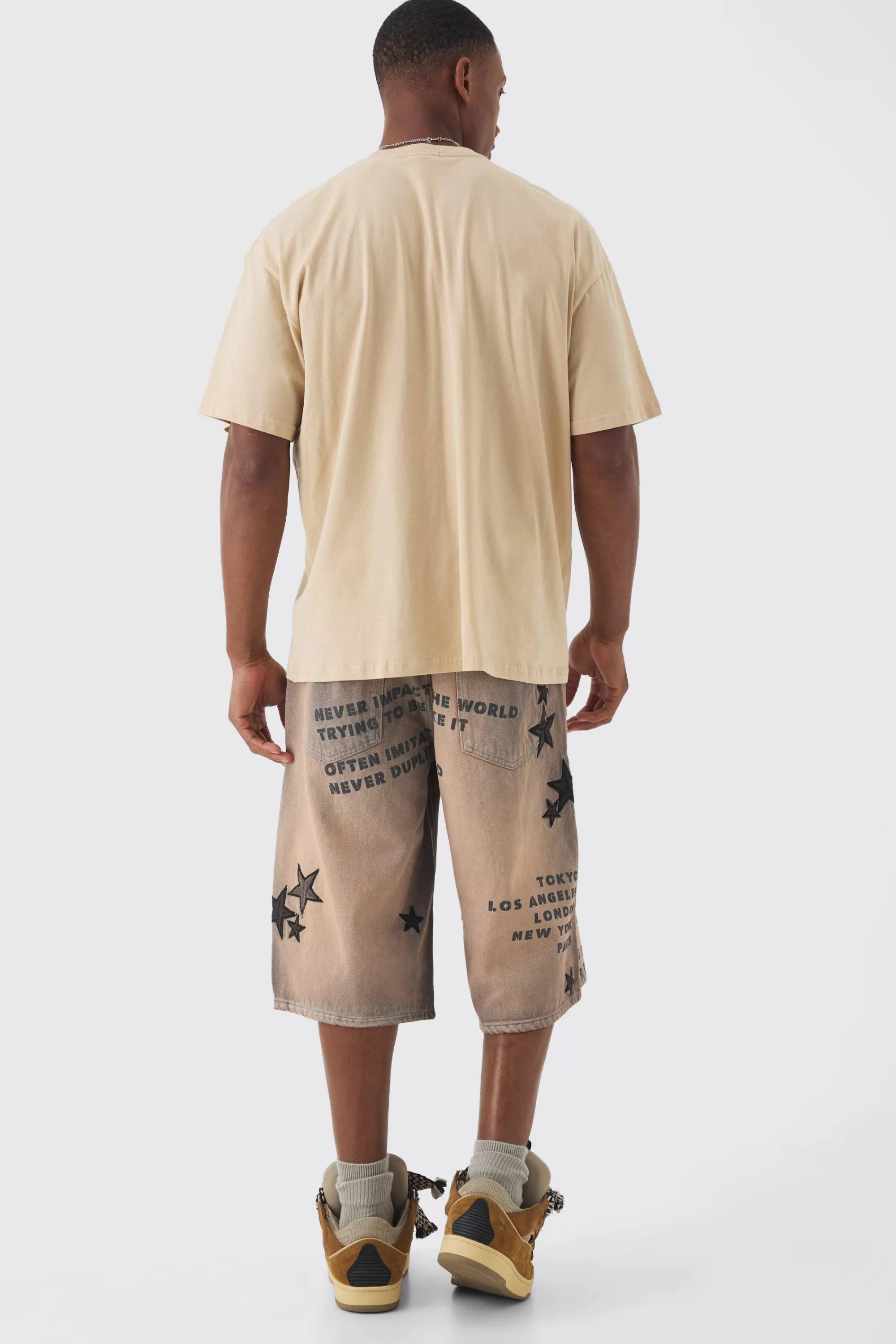 boohooMAN Oversized Extended Neck Washed Limited Edition T-shirt | UK sand Clearance