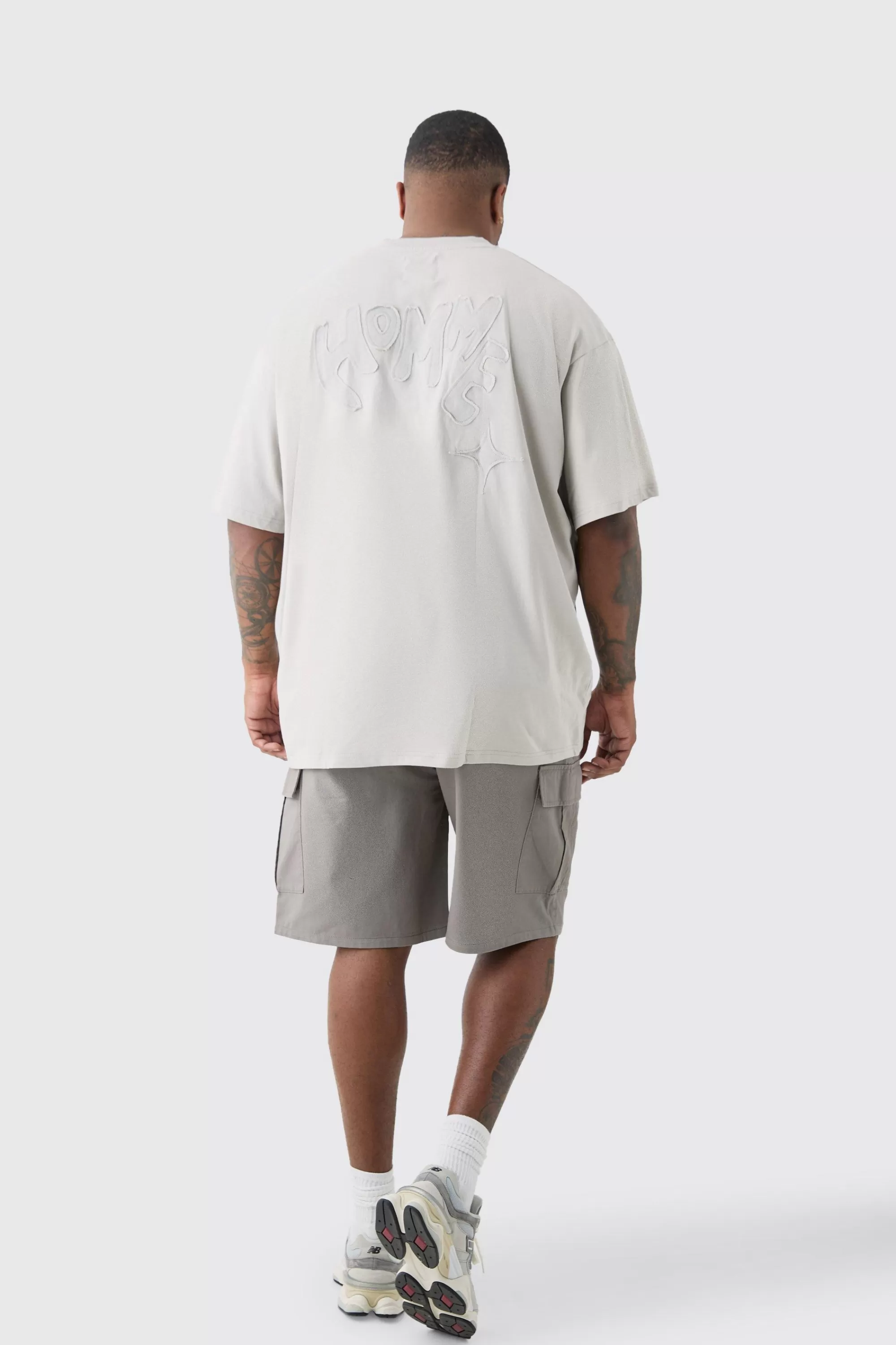 boohooMAN Plus Distressed Applique Loose V Neck T-shirt In | UK grey Fashion