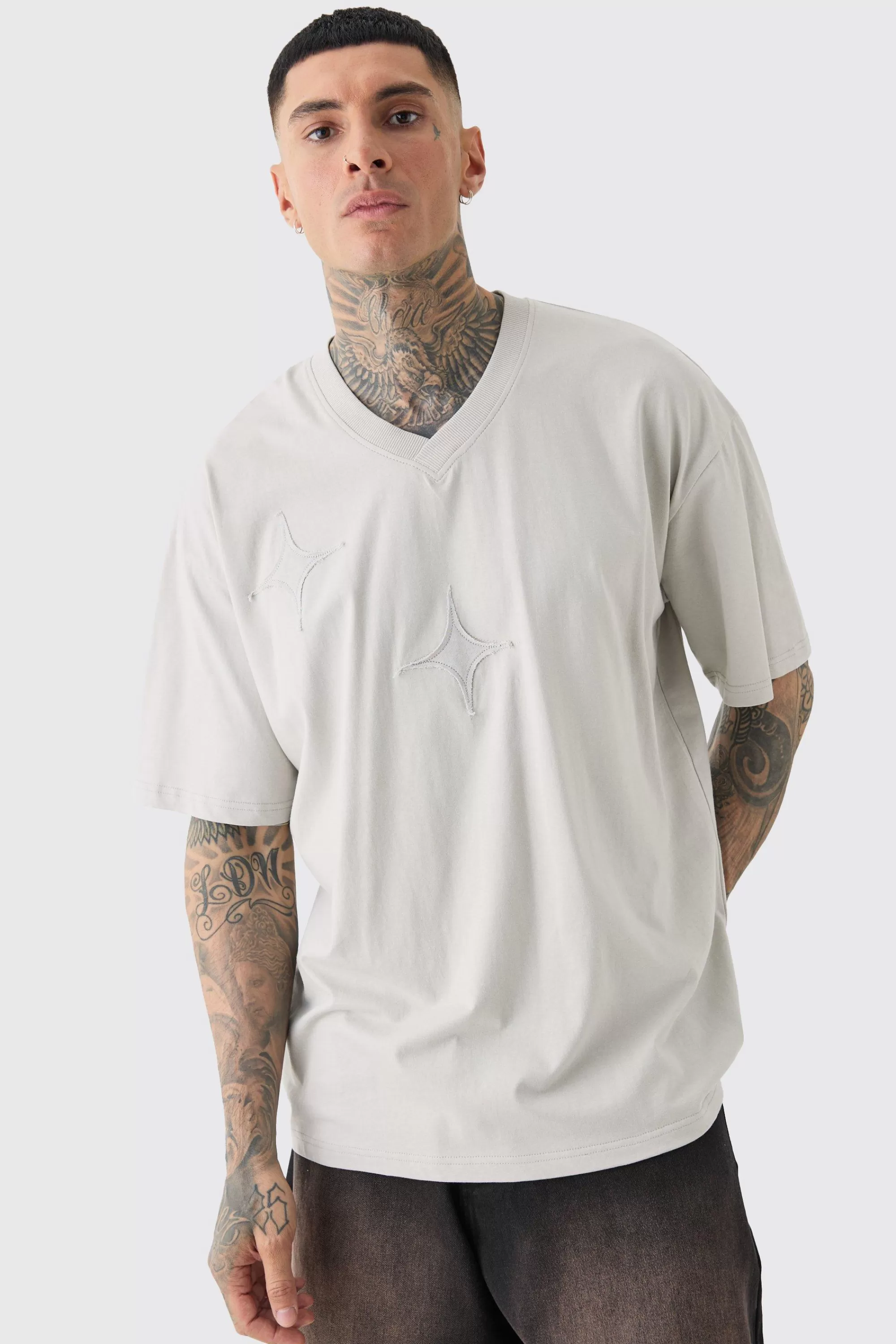 boohooMAN Tall Applique Distressed Loose V Neck T Shirt In | UK grey Discount