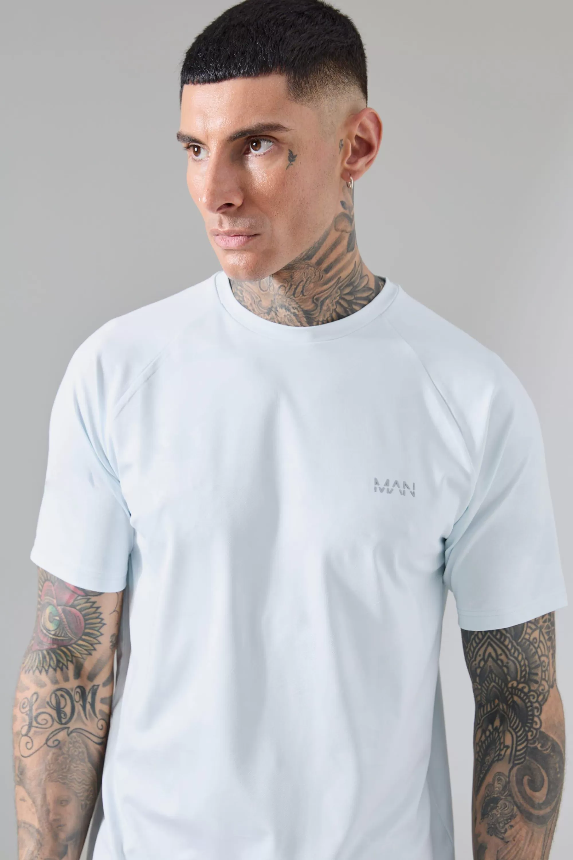 boohooMAN Tall Man Active Camo Raglan Performance T-shirt | UK blue Clearance