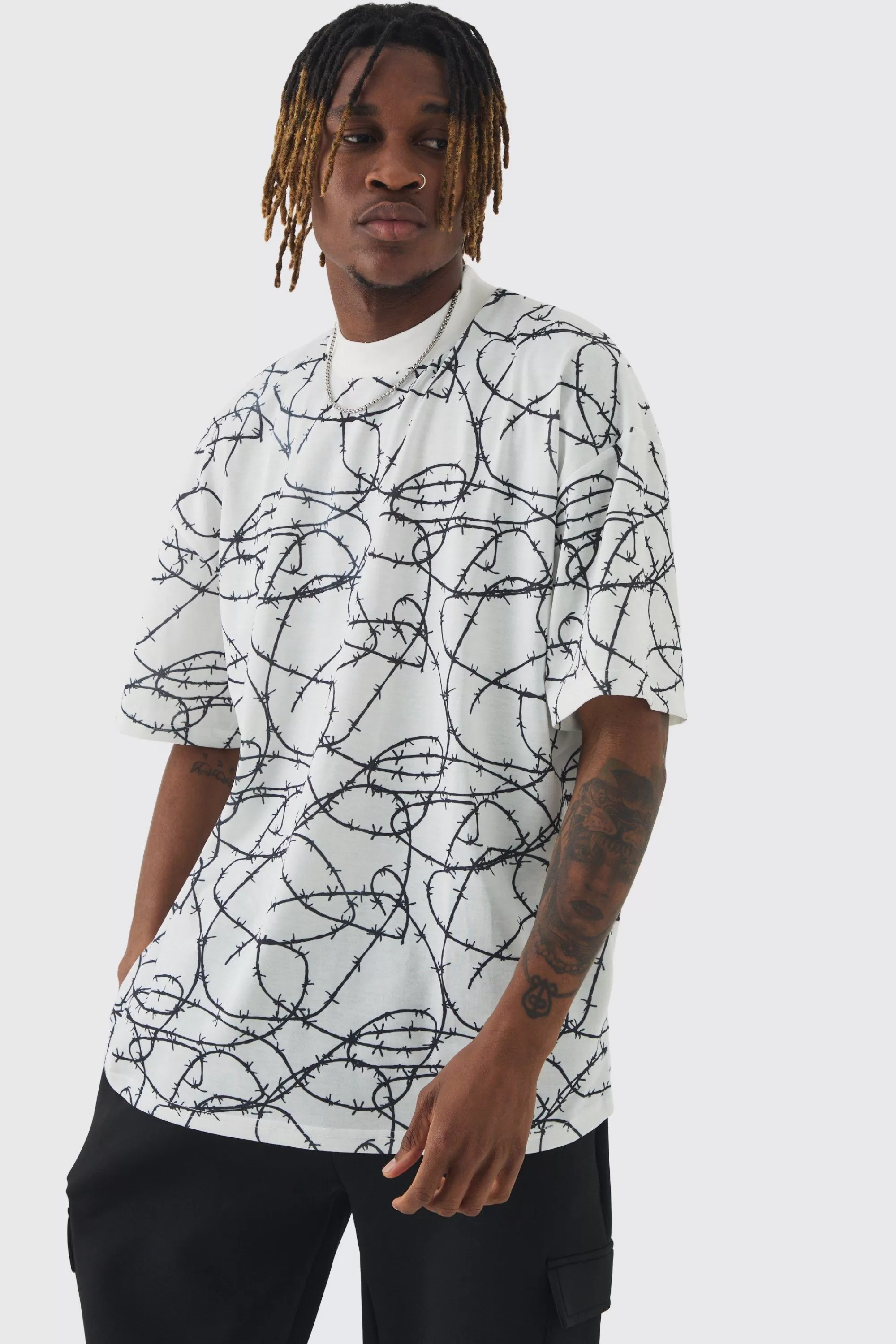boohooMAN Tall Oversized Extended Neck Barbed Wire Graphic T-shirt | UK white Fashion