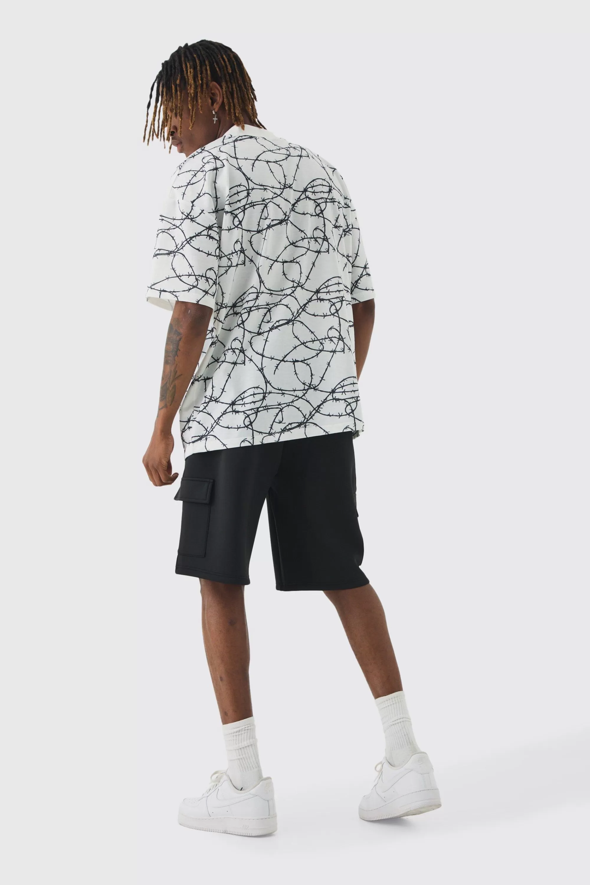 boohooMAN Tall Oversized Extended Neck Barbed Wire Graphic T-shirt | UK white Fashion
