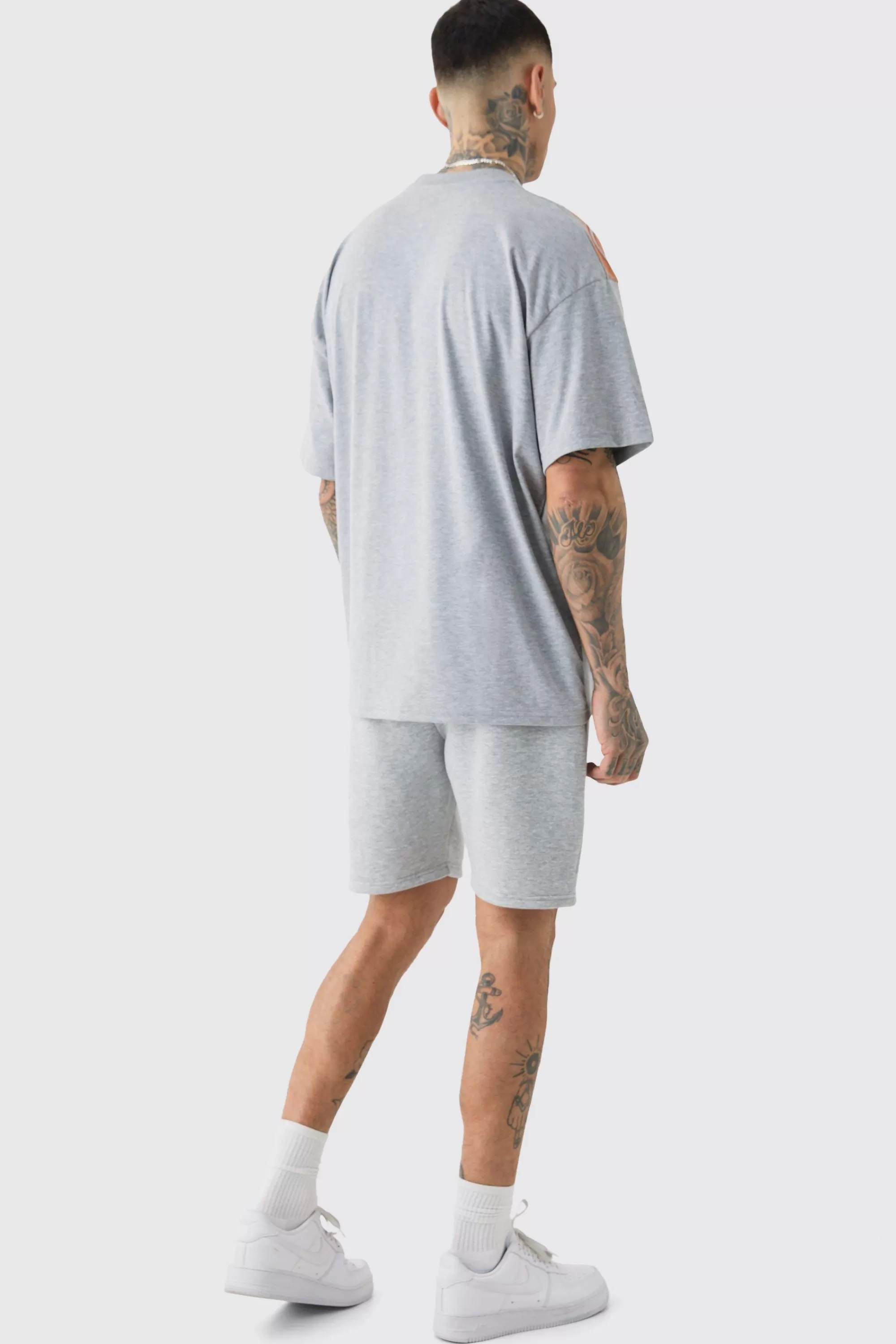 boohooMAN Tall Oversized Extended Neck Gothic Man Grafitti Spray T-shirt | UK grey Shop