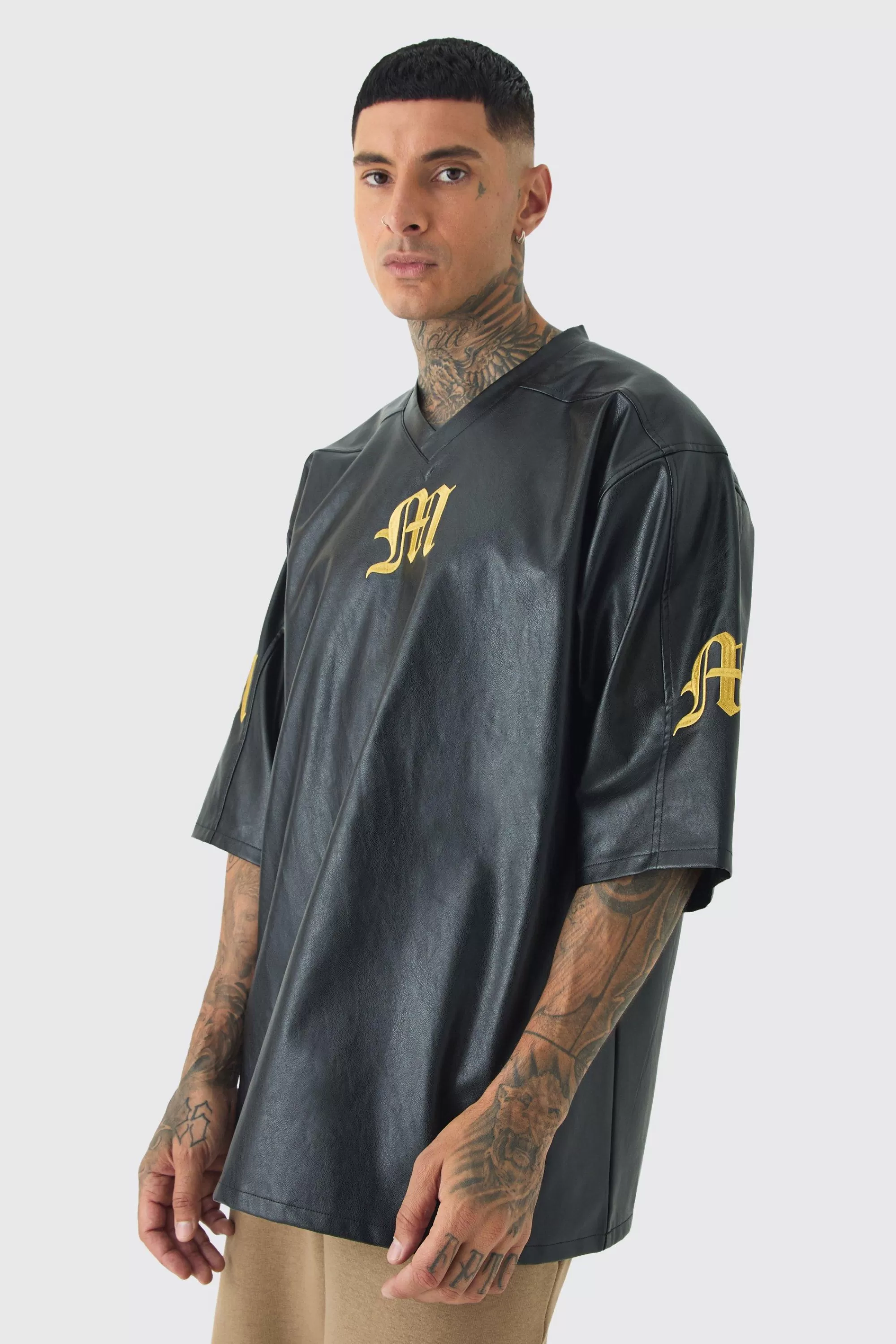 boohooMAN Tall Oversized PU Raglan Embroidered Varsity Shirt | UK black Online